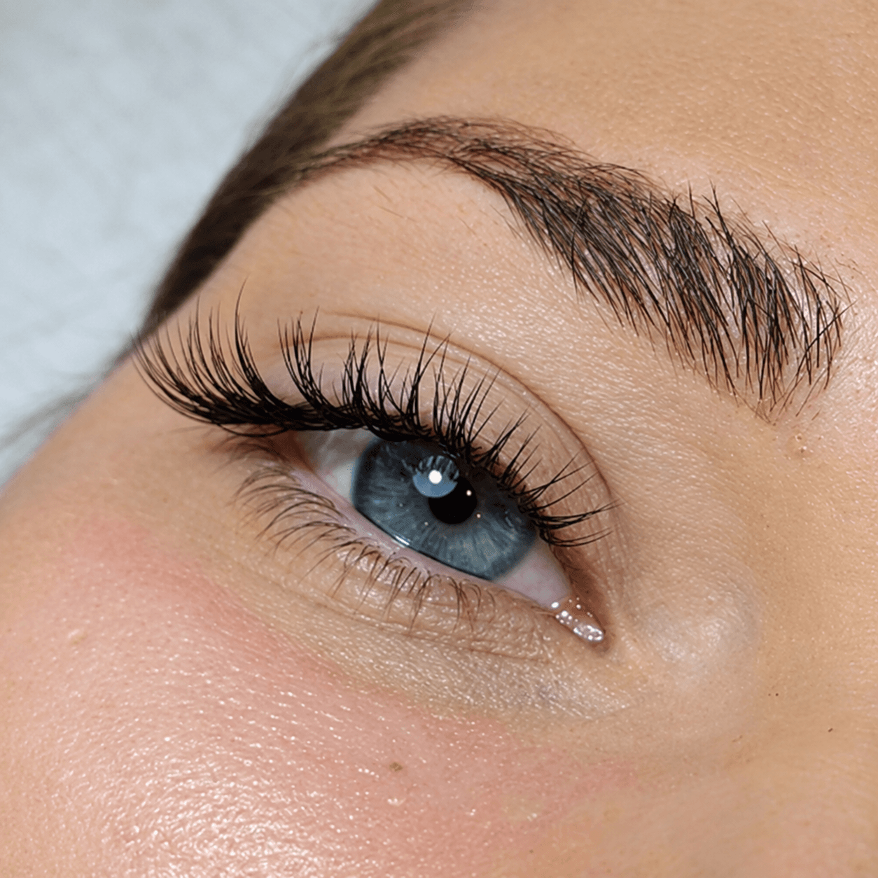 Close-up eyelash extension result by Jay Lash and Brow